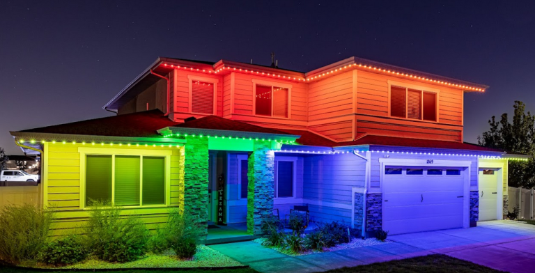 House with zoned permanent lighting in multiple colors